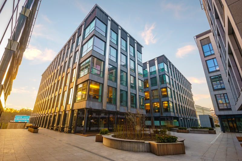 Modern UK office buildings with extensive commercial glazing and aluminium frames